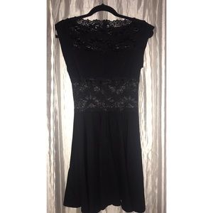 Bebe Black lace fur and flare dress